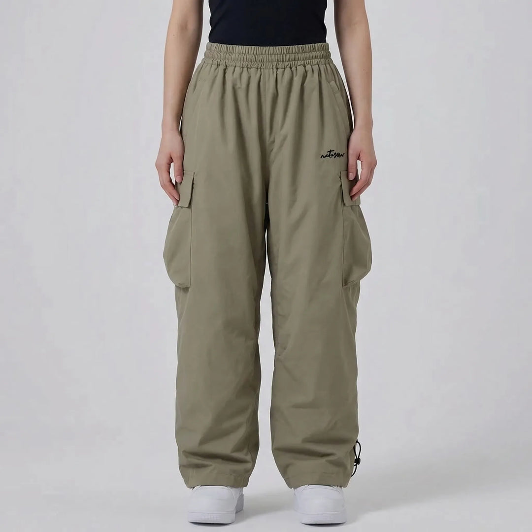 Women's baggy cargo ski trousers in winter snow