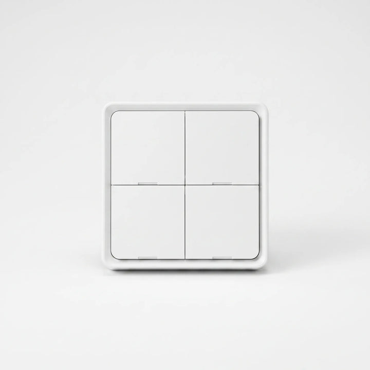 Front view of the white 4-gang smart scene switch on a neutral background