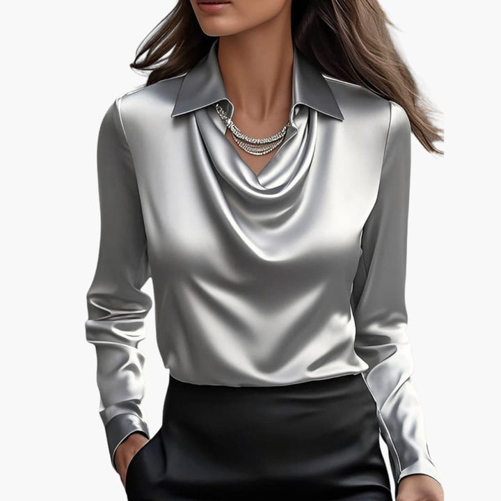Elegant evening wear top with long sleeves and draped neckline