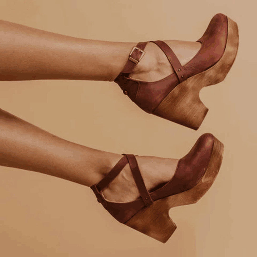 Closed toe formal party wedge heels showing side profile and stylish buckle
