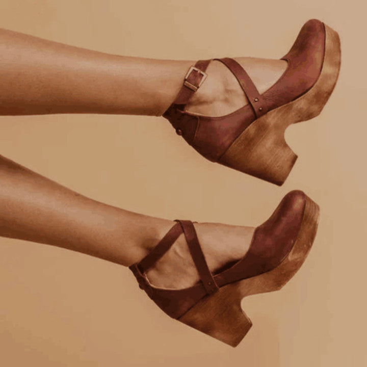 Closed toe formal party wedge heels showing side profile and stylish buckle