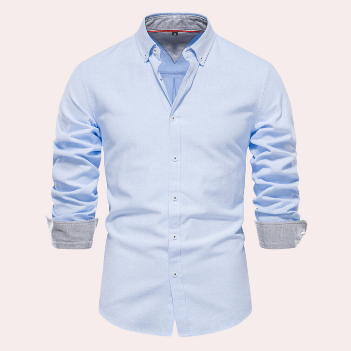 Men's casual long sleeve shirt in light blue showcasing collar and cuffs