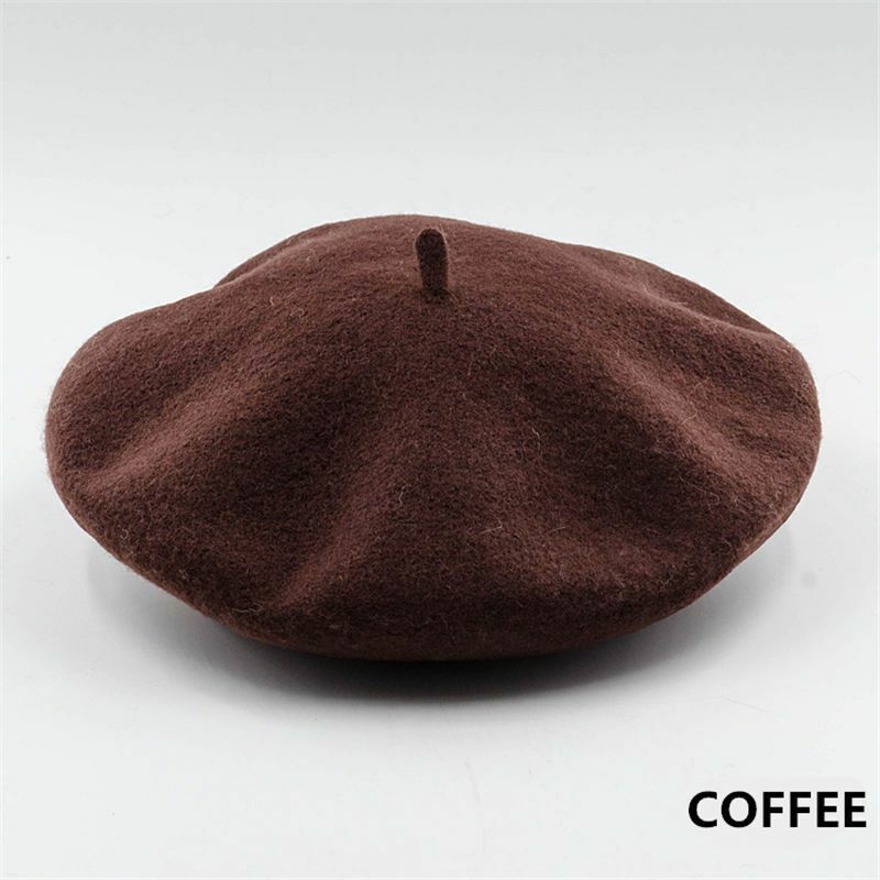 Side angle view of classic wool beret for women winter fashion