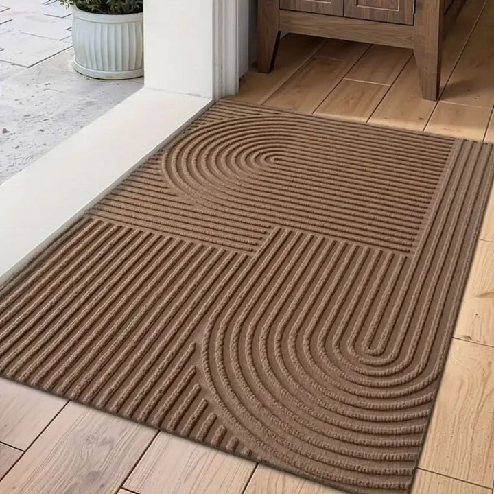 Close-up of textured fabric on indoor washable mat with waves