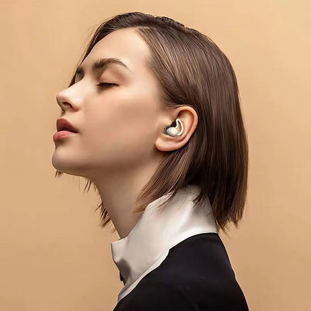 Woman wearing sleep earplugs peacefully
