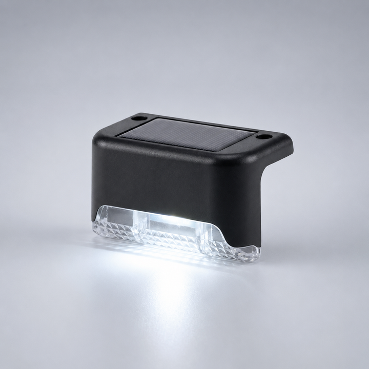 Energy-efficient solar-powered step light in daylight, showing sleek design