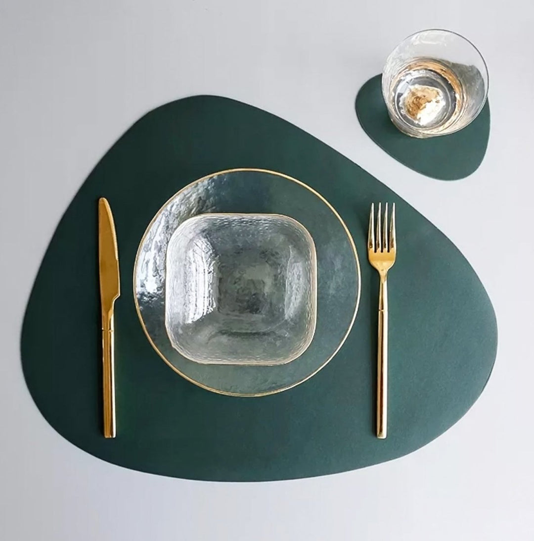 Green modern table placemat and coaster set with glass bowl and gold cutlery
