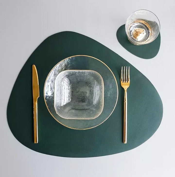 Green modern table placemat and coaster set with glass bowl and gold cutlery