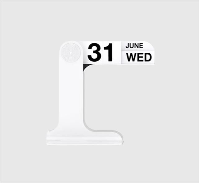 Close-up of minimalist perpetual calendar for desktop organization