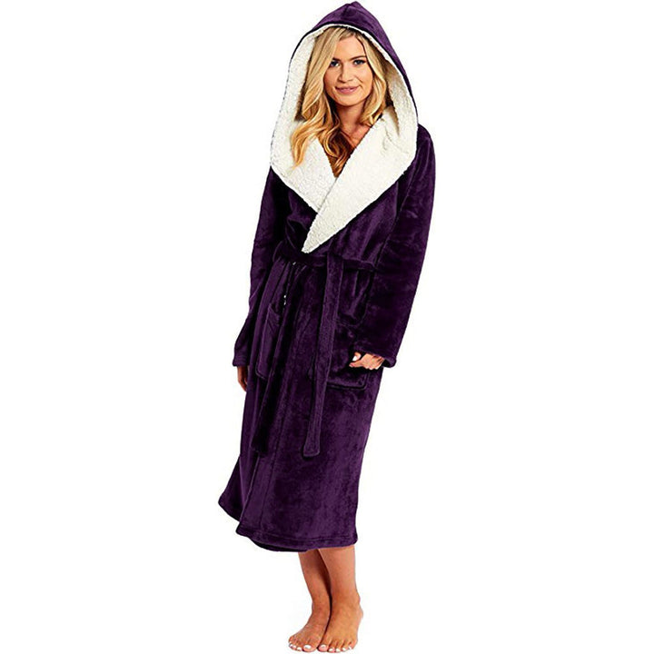 Woman wearing a purple hooded dressing gown showcasing full-length comfort