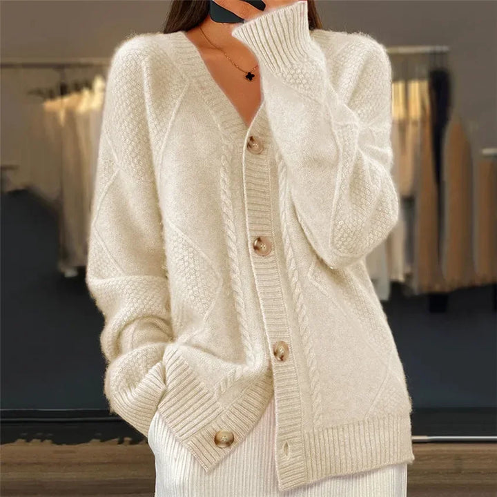 Side profile of womens button-up knit cardigan sweater showcasing fit and long sleeves