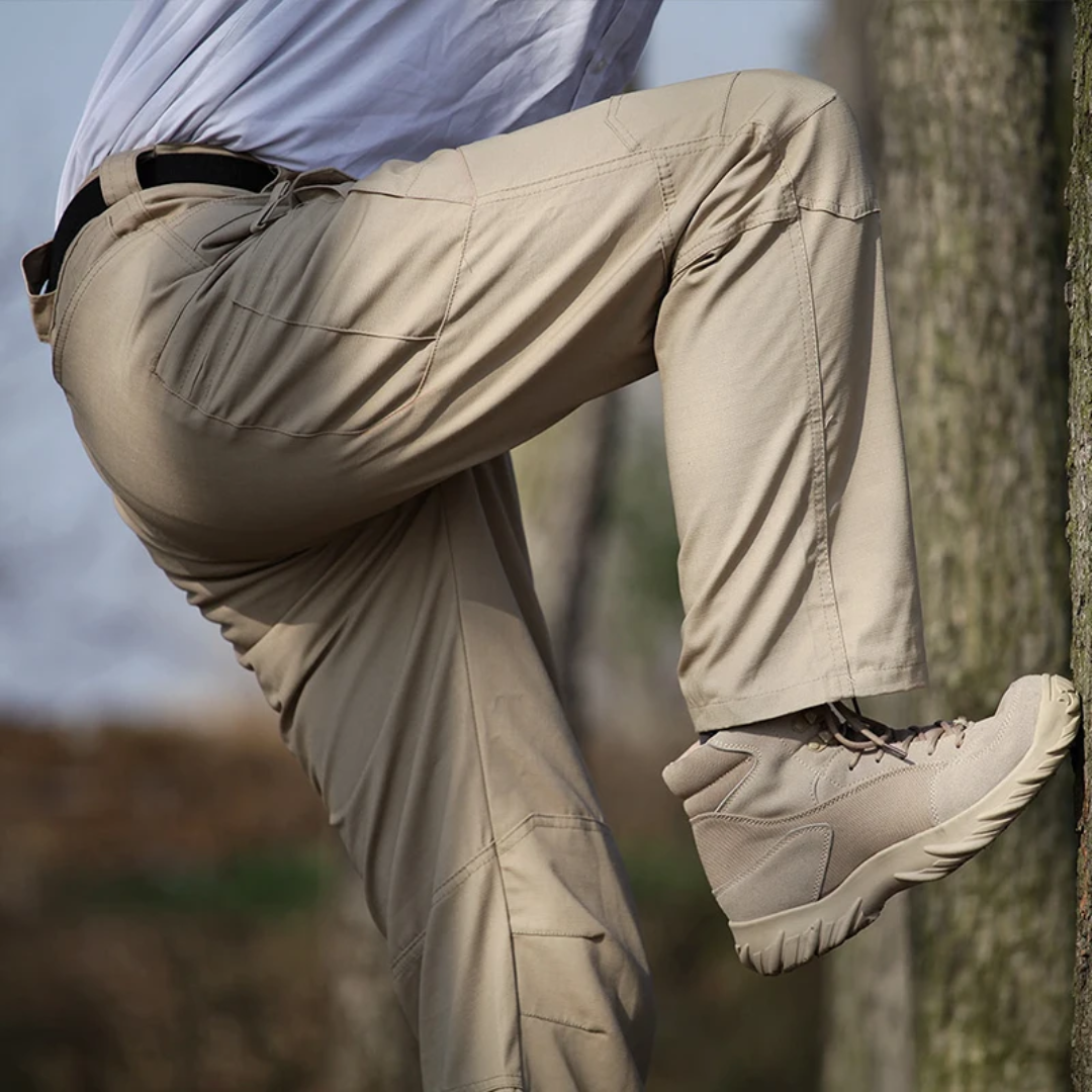 Detailed shot of heavy duty zipper and closure on mens climbing cargo pants