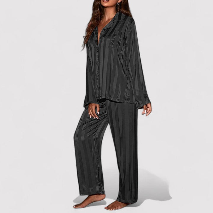 Close-up of satin stripe pajamas fabric texture for women loungewear