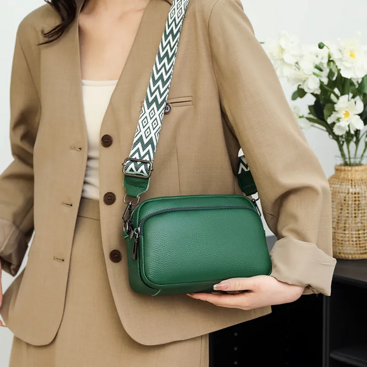Hanging shot of the stylish leather crossbody bag