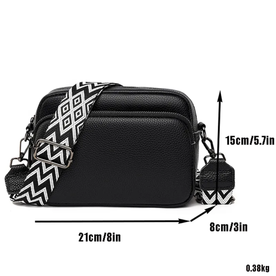 Black women's modern leather messenger bag showing dimensions