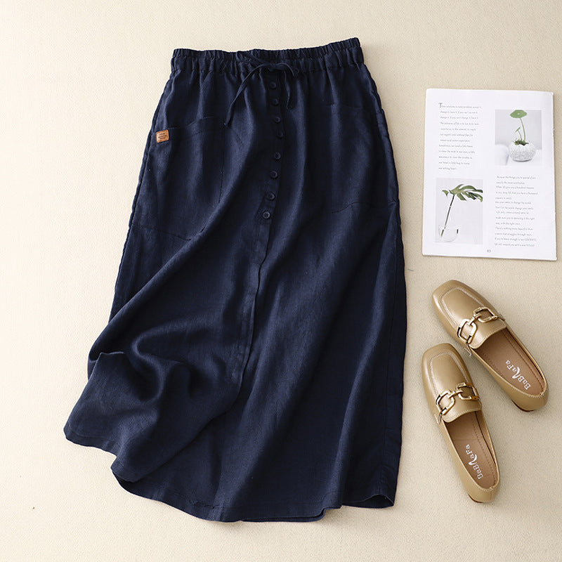 Navy blue casual midi skirt showcasing A-line silhouette and pockets