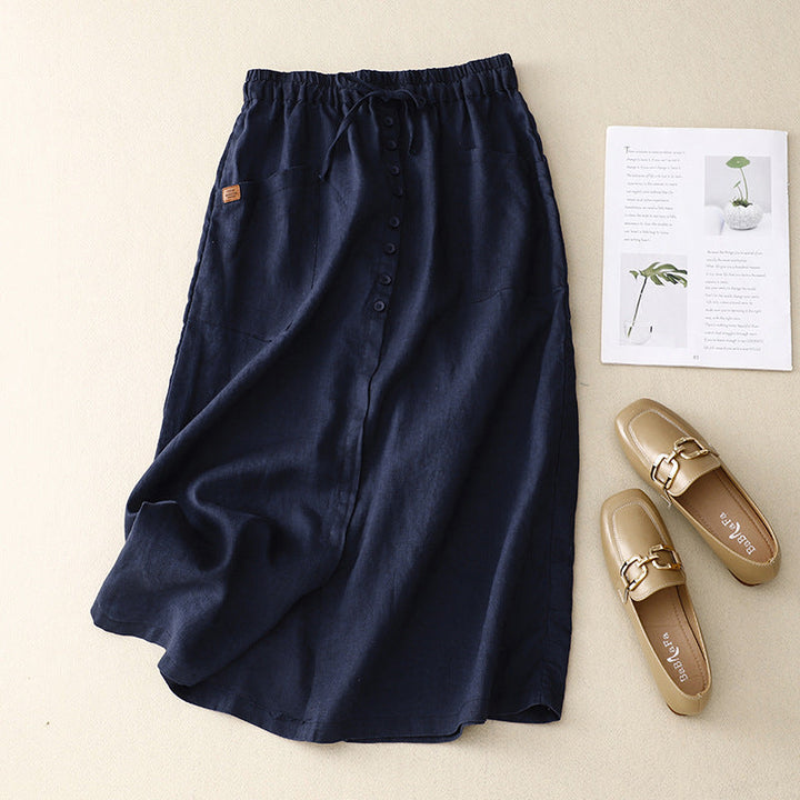 Navy blue casual midi skirt showcasing A-line silhouette and pockets