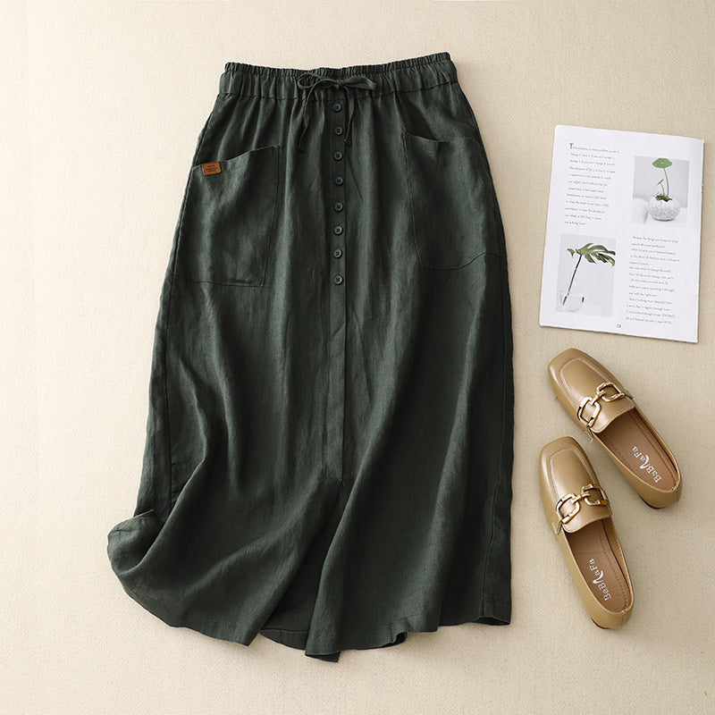 Close-up of the adjustable drawstring waist on a casual green womens midi skirt