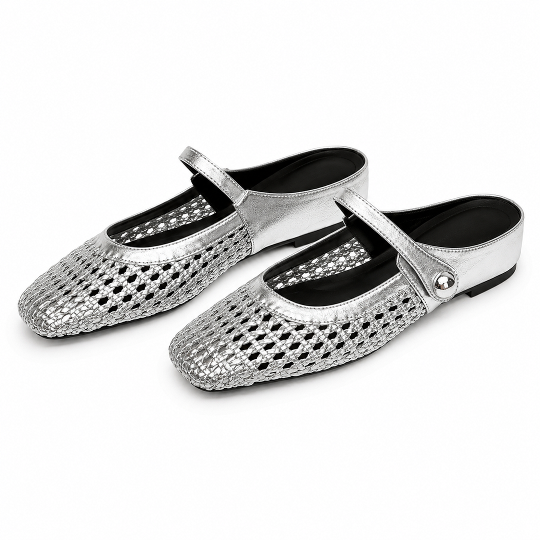 Pair of casual women's slip-on clogs displayed on a clean background