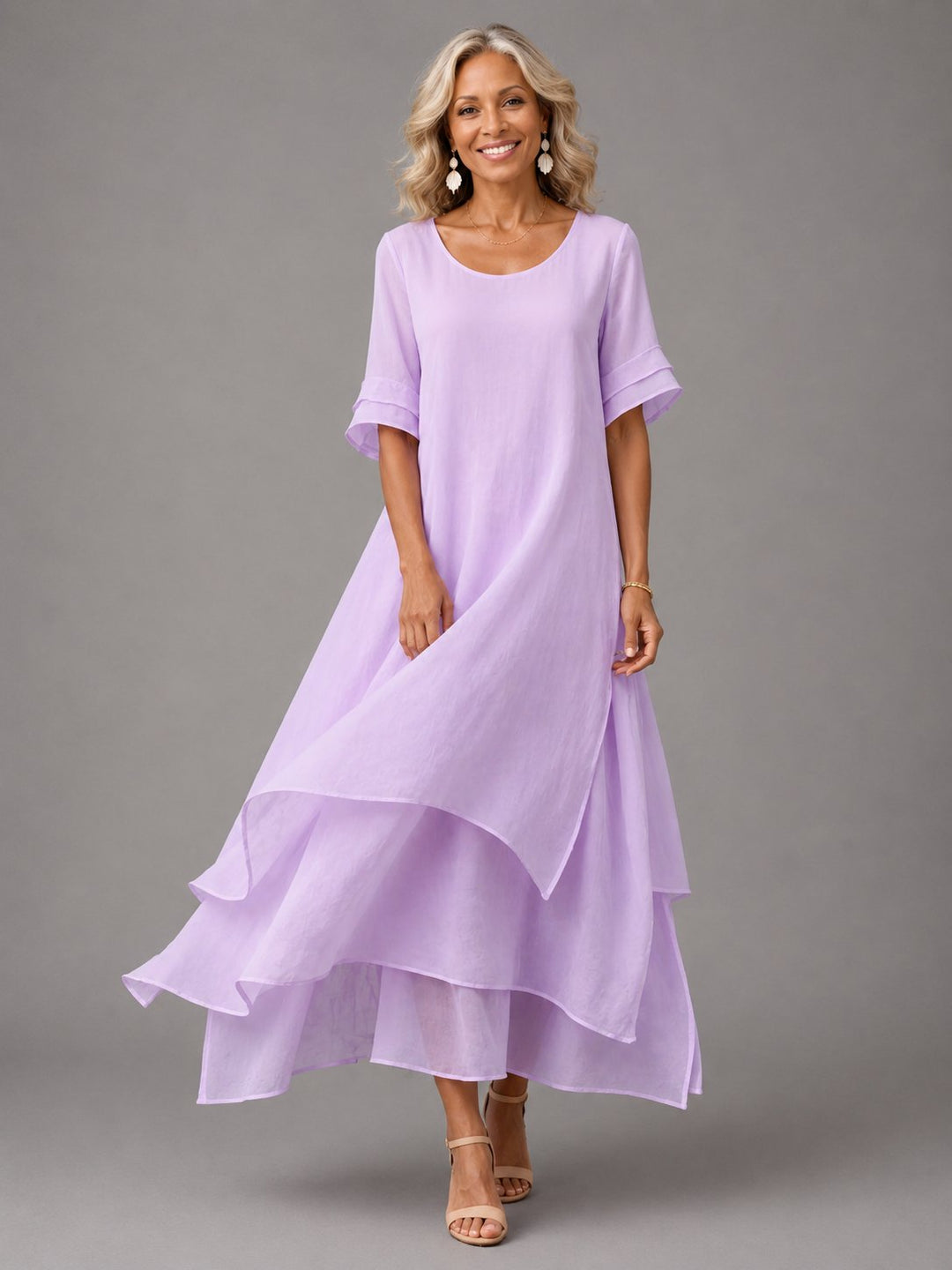 Side angle of the flowing long dress showing graceful casual movement