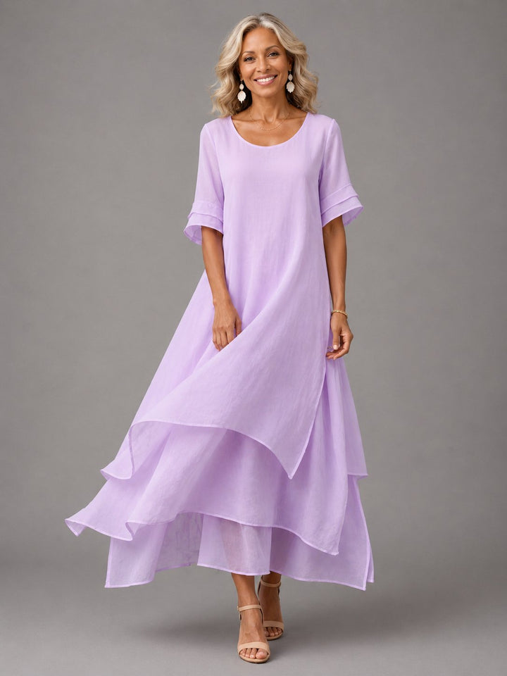 Side angle of the flowing long dress showing graceful casual movement