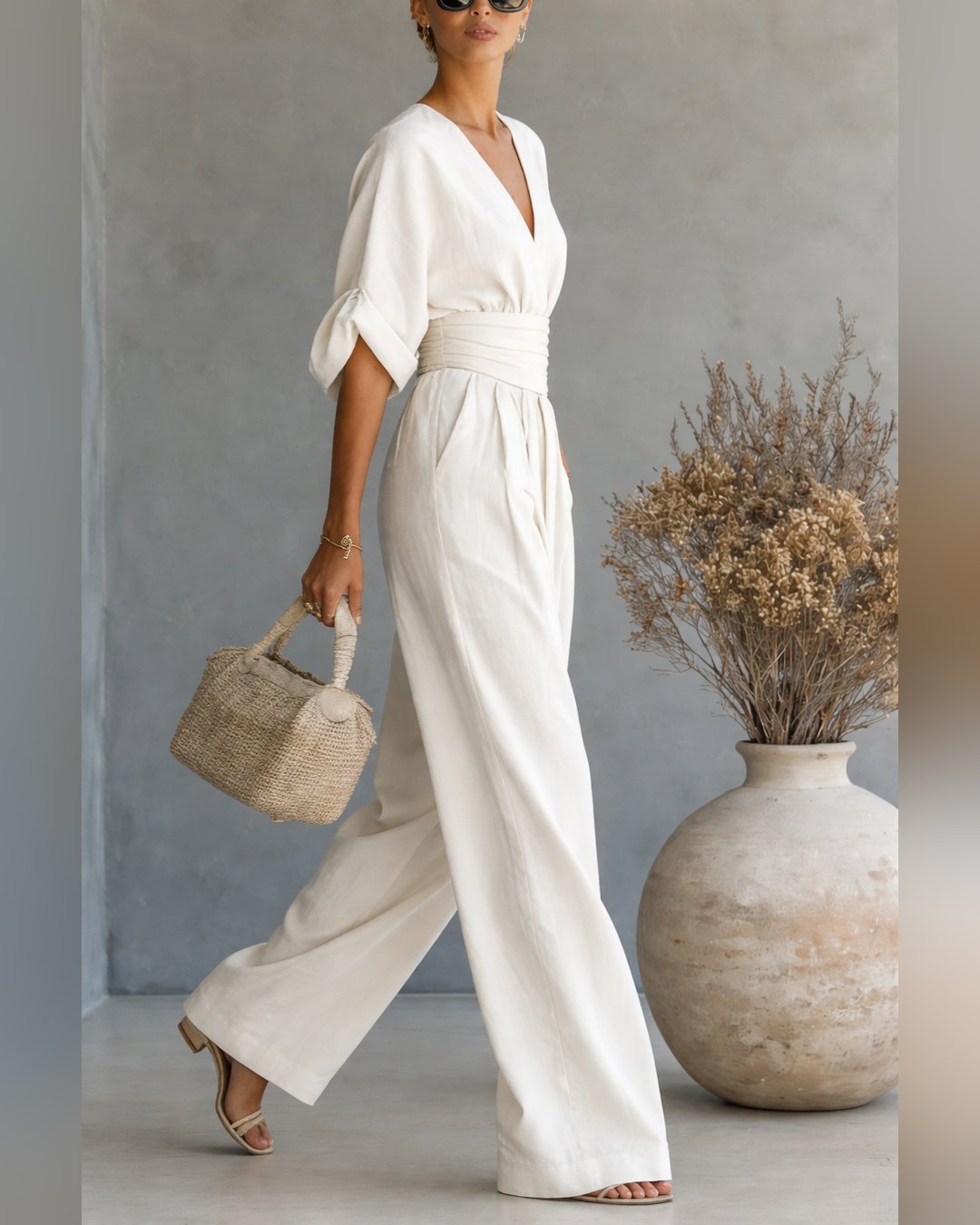 Detailed shot of the sleeve cuff and stitching on the elegant one-piece apparel