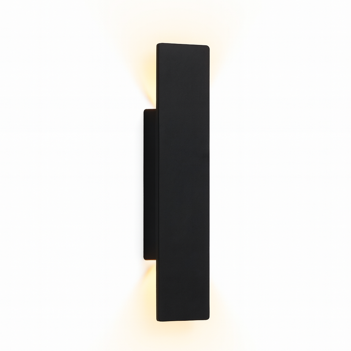 Modern black LED wall light mounted against a plain background