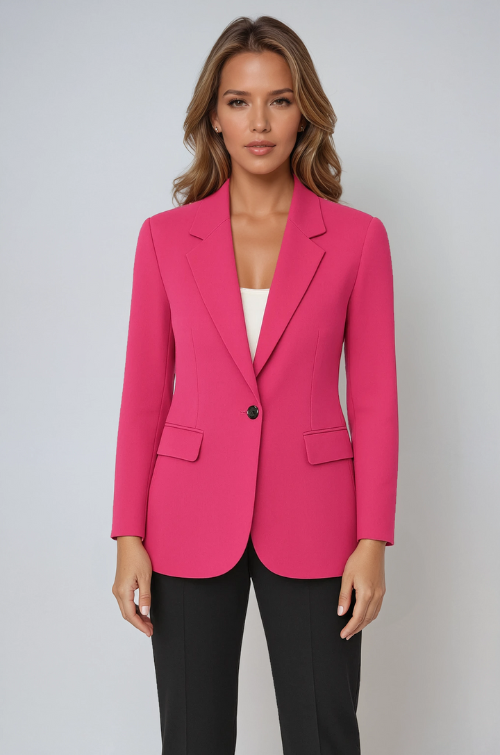 Model wearing vibrant pink tailored single-button blazer