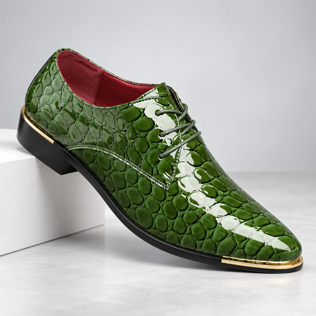 Green textured men's lace-up dress shoe displayed on white podium