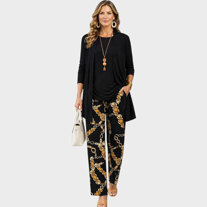 Final lifestyle view of the women's floral pants and cardigan set