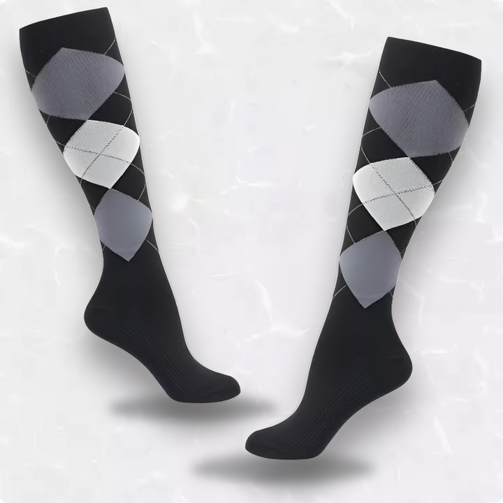 Pair of black and grey plaid patterned compression socks displayed neatly