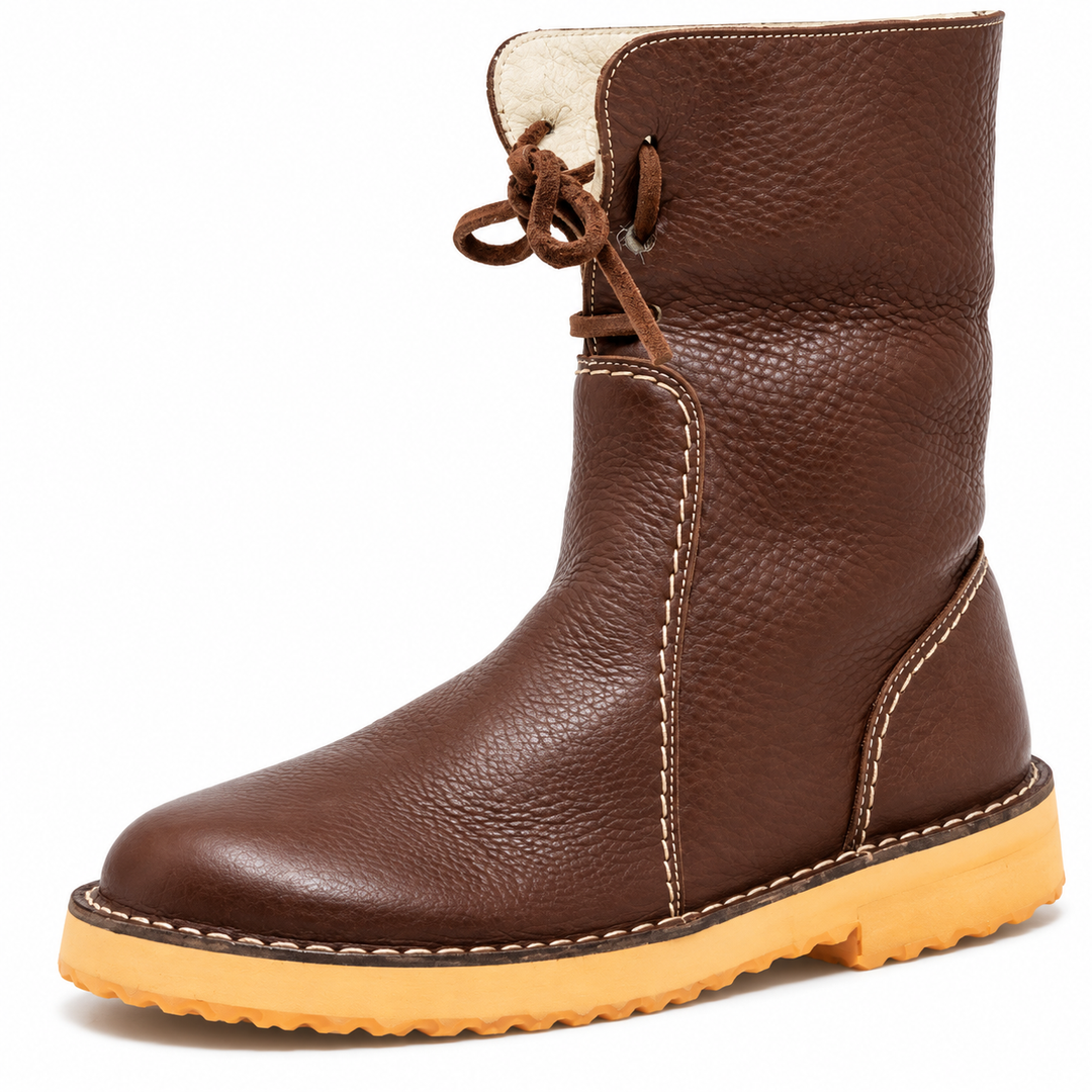 Brown women's winter ankle boot with decorative side stitching and cream lining