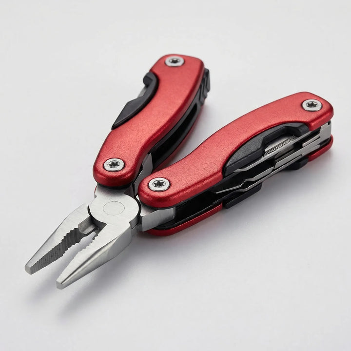 Versatile survival gear pocket knife opened to display multiple folding attachments