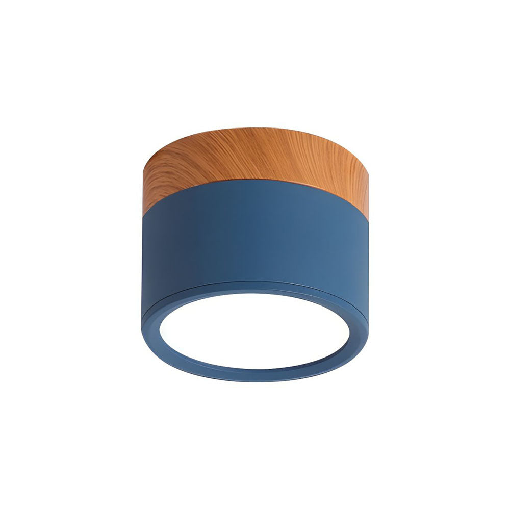 Final angle of modern cylindrical LED ceiling light in room setting