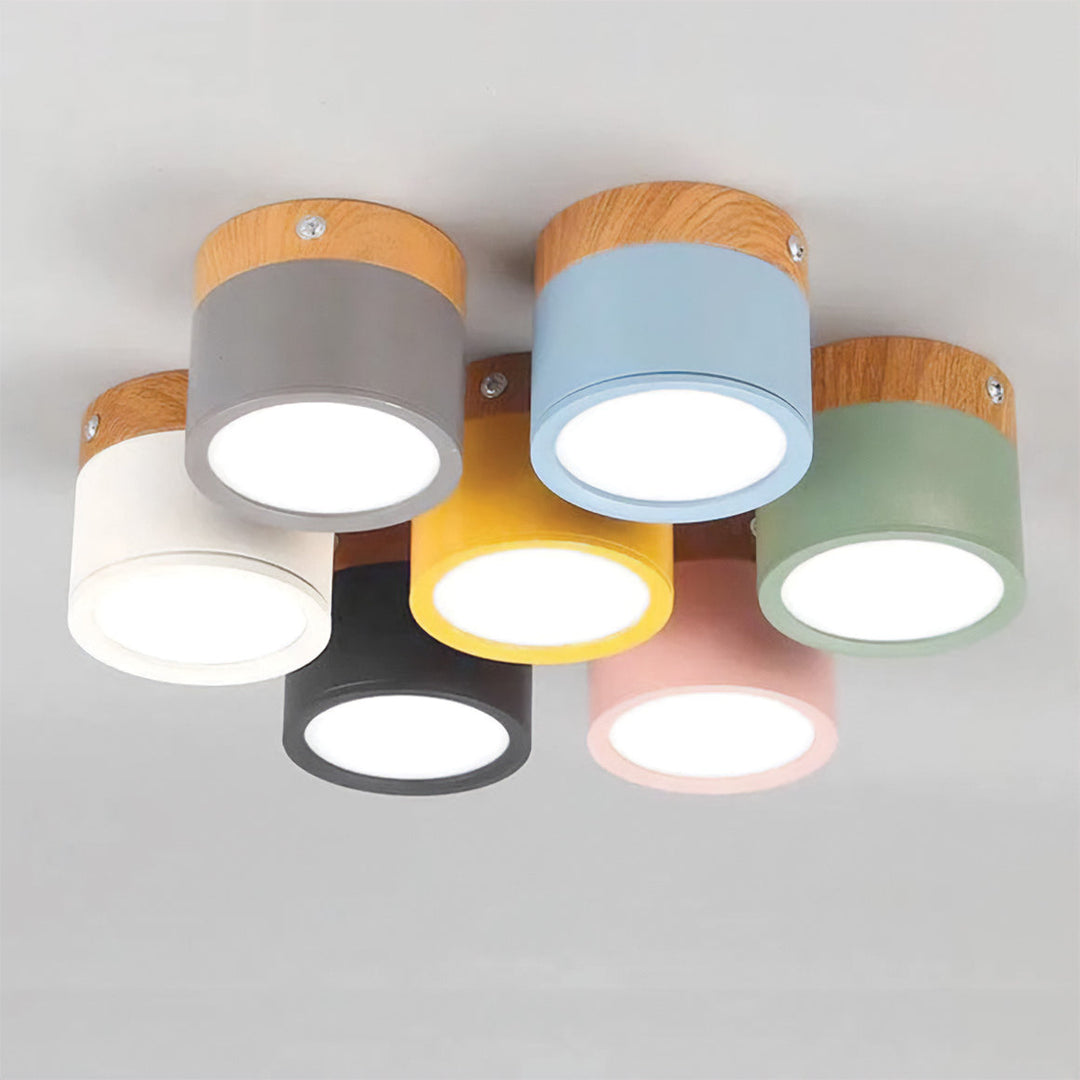 Sleek LED cylinder lighting fixture mounted on white ceiling