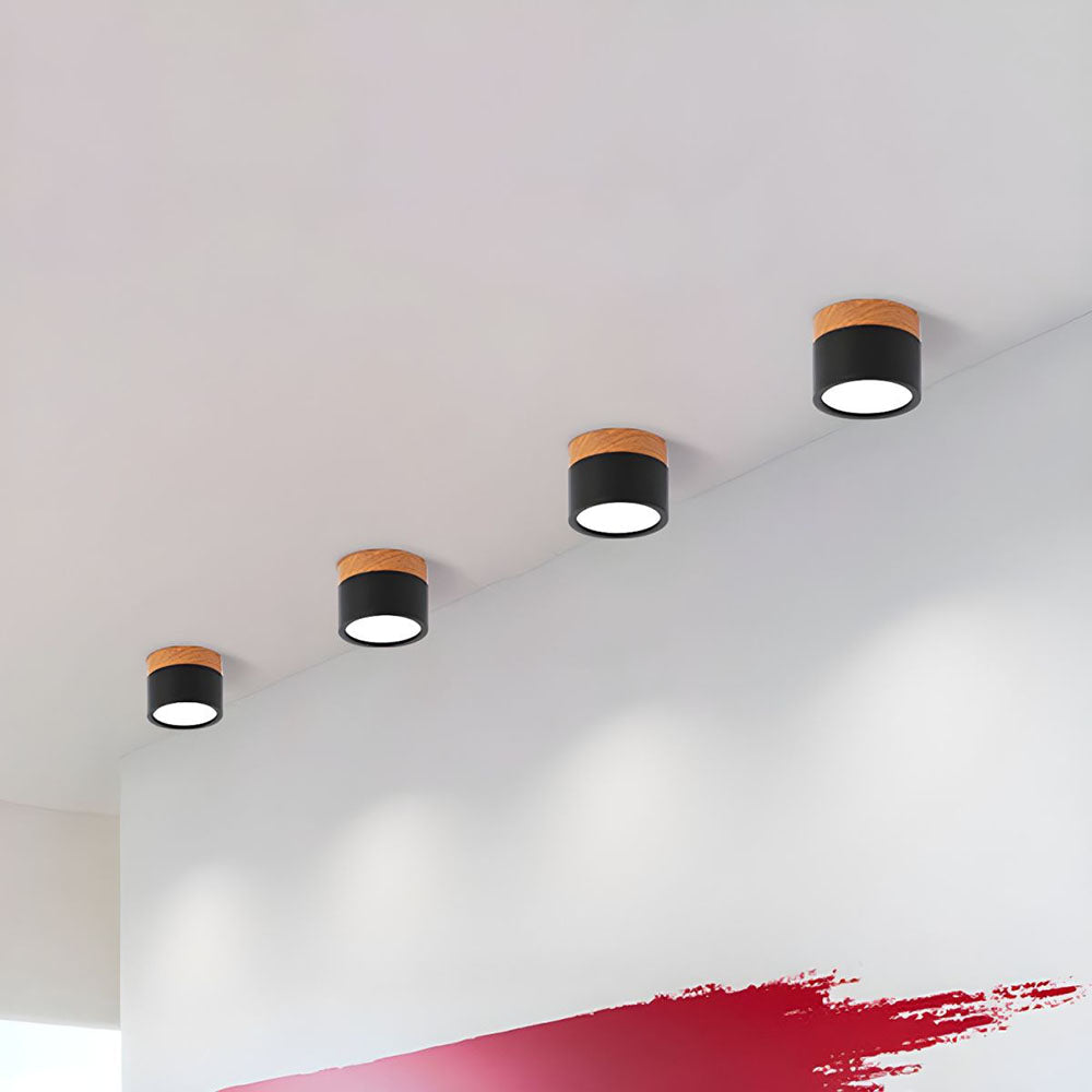 Bright warm glow from cylindrical LED flush mount ceiling lamp
