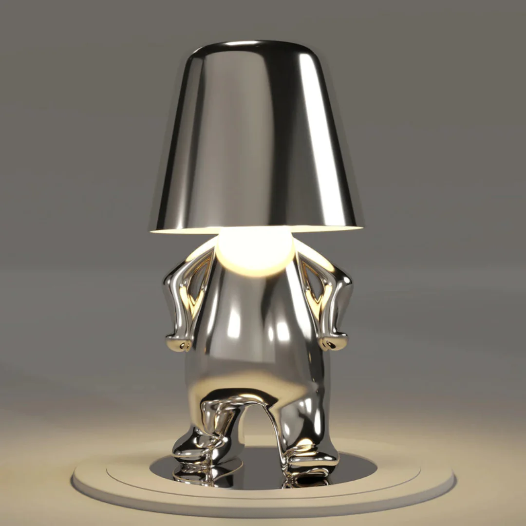 Artistic table lamp glowing brightly to accent contemporary interior design