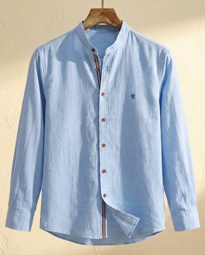 Light blue long-sleeve button-down shirt front view on hanger