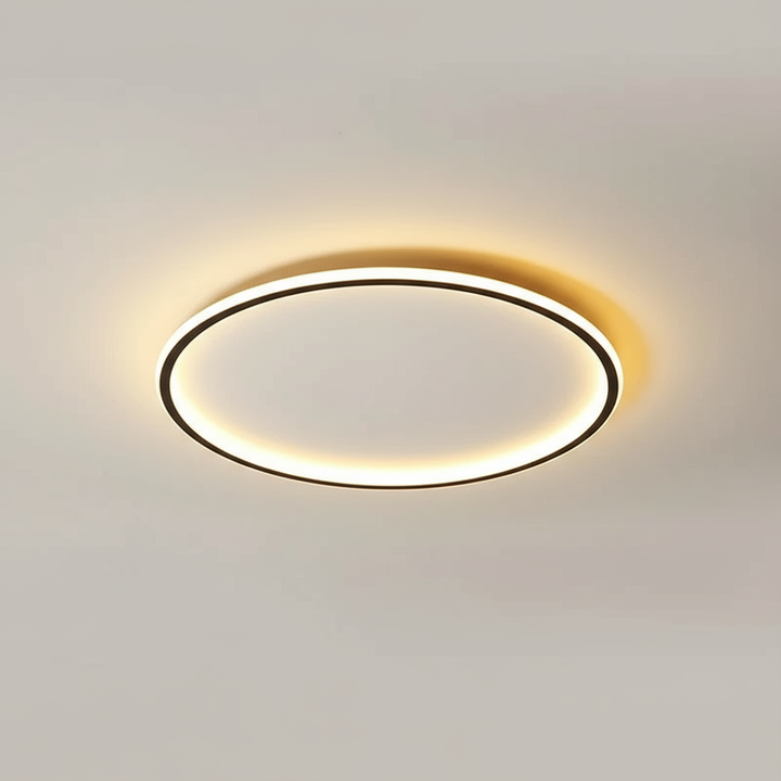 Round Scandinavian LED Ceiling Lamp glowing against a neutral ceiling background