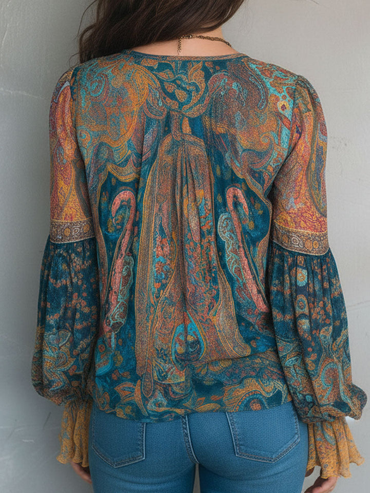 Casual wear teal blouse with elegant paisley print, back view