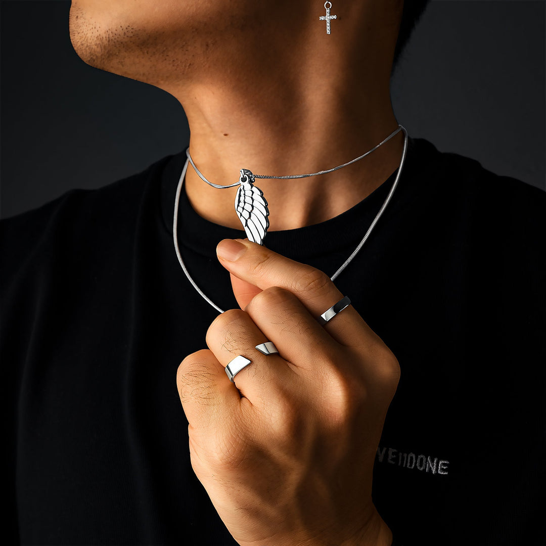 Lifestyle shot highlighting the Arvid Men's Open Band Ring worn with a casual black t-shirt.