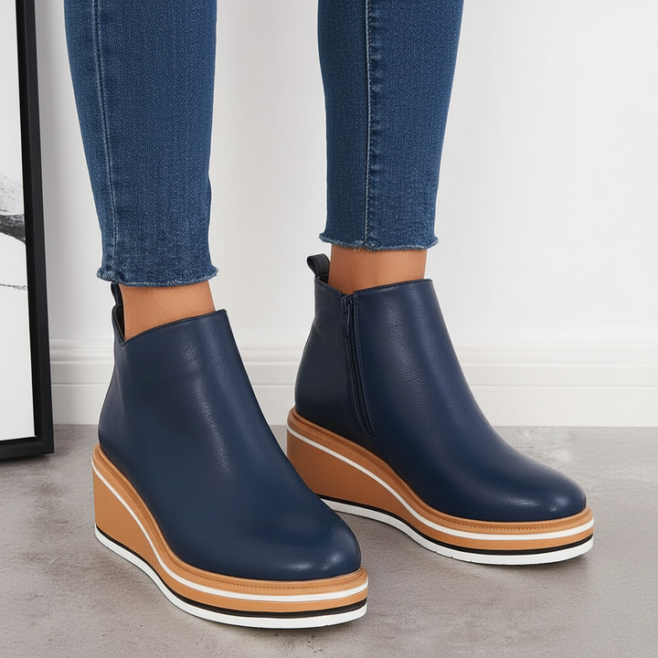 Close-up of side zipper detail on comfortable women's platform boots