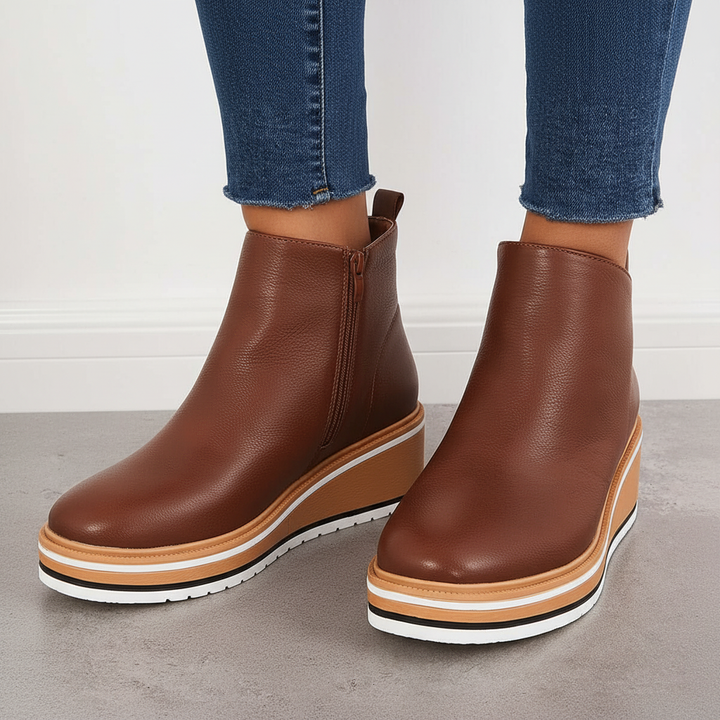 Pair of trendy women's platform ankle boots styled for casual wear