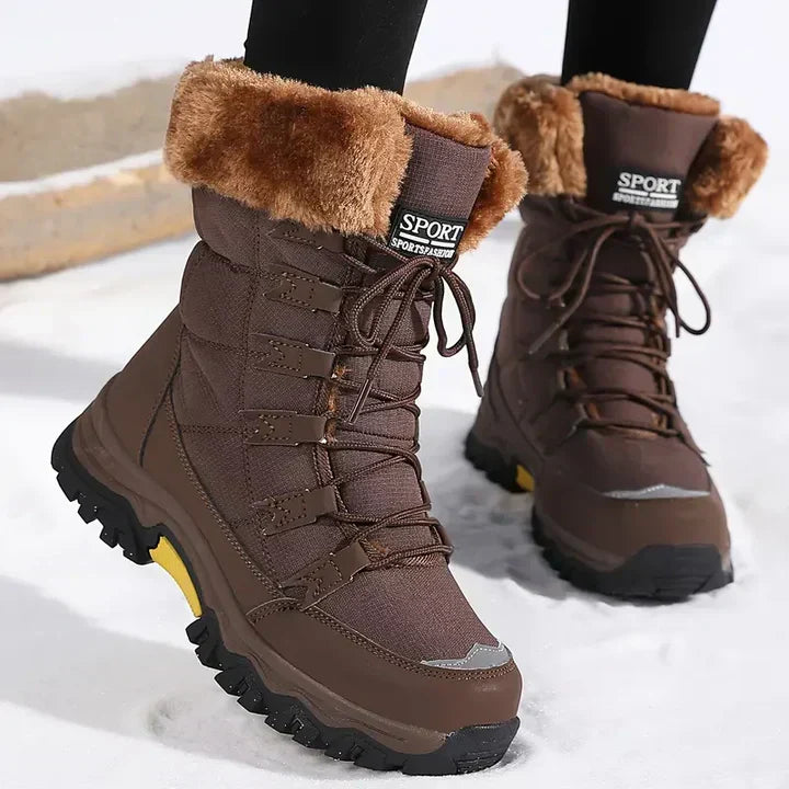 Brown women's winter snow boots featuring cozy inner lining and lace-up design