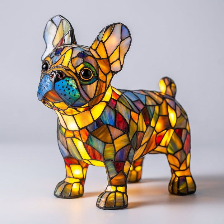 Stained glass dog accent lamp glowing warmly in a dark room