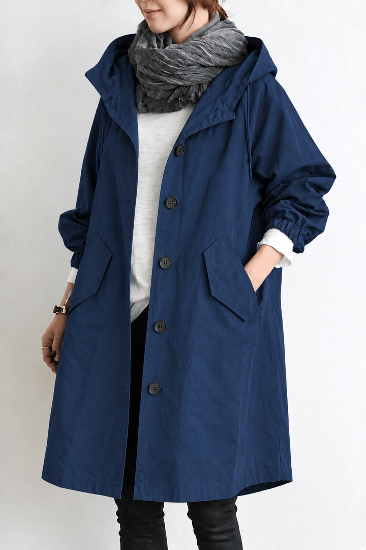 Side profile of the stylish womens spring coat, highlighting its functional deep pockets.