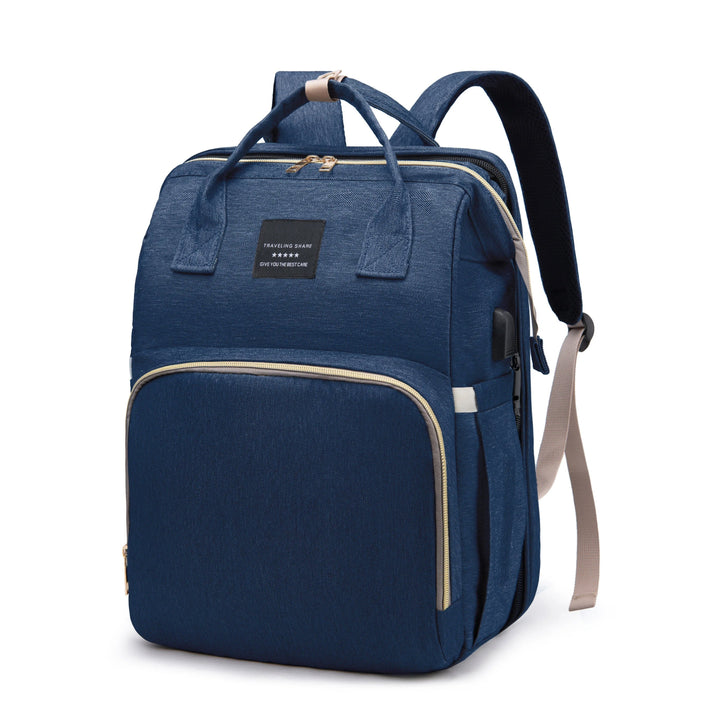 Side profile of the nappy bag displaying insulated bottle pockets and USB charging port
