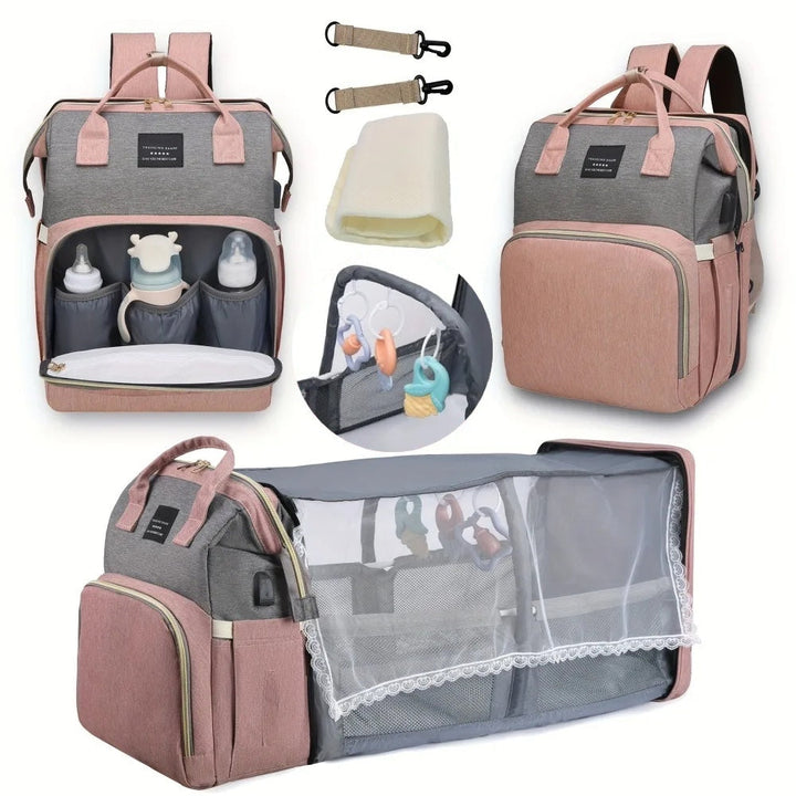 Mother carrying the stylish nappy bag backpack comfortably while holding a baby