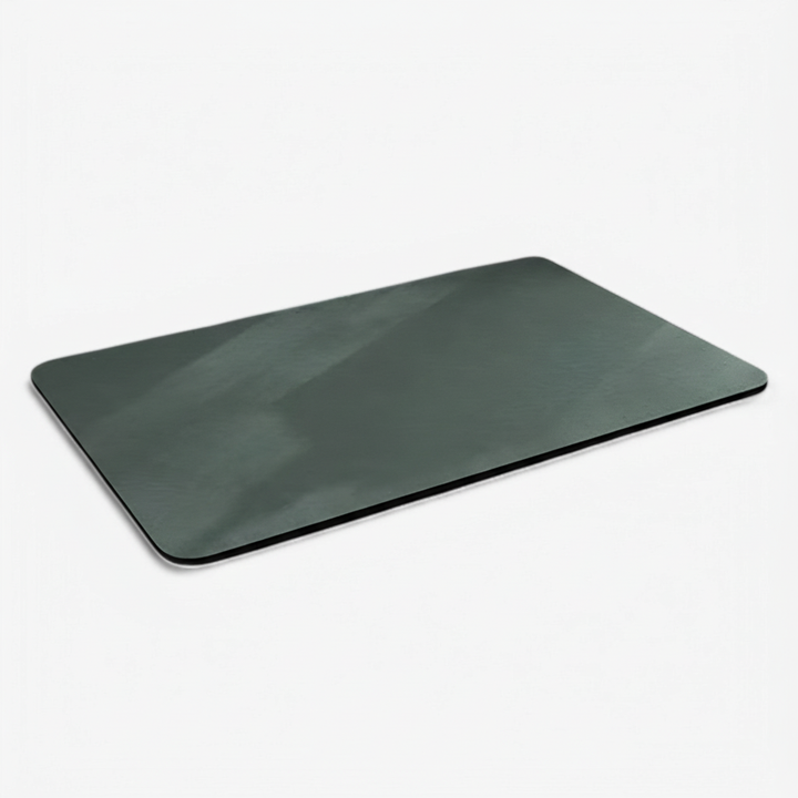Minimalist absorbent diatomite floor mat styled in a contemporary bathroom setup
