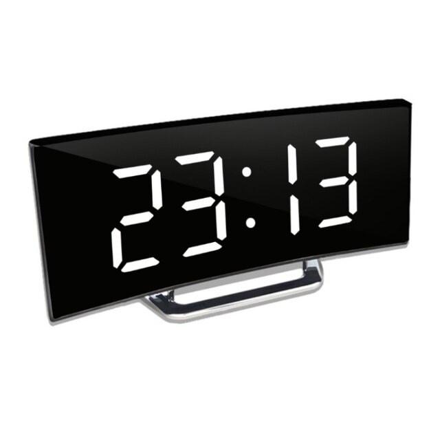 Mirrored LED alarm clock angled to display the reflective face and modern rectangular bedside design.